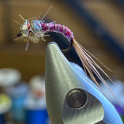 Hand-tied fly on the vise