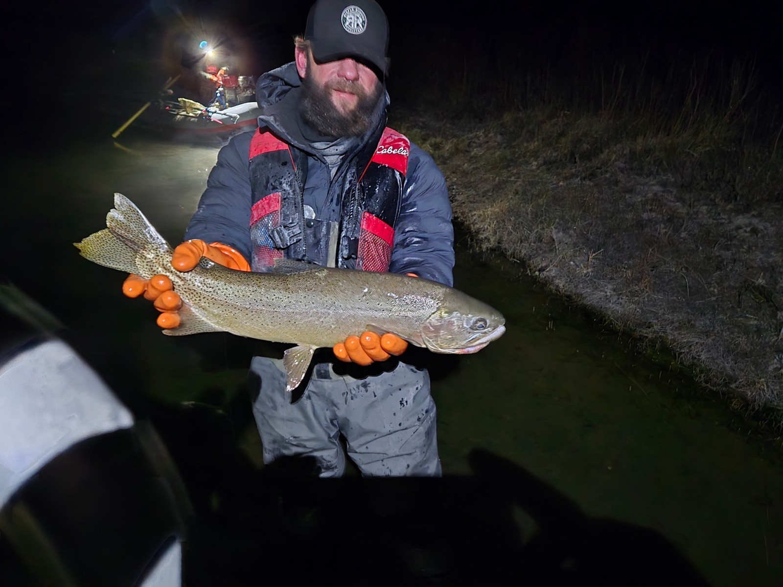 Trophy trout landed after dark with Riffle Riders Outfitters