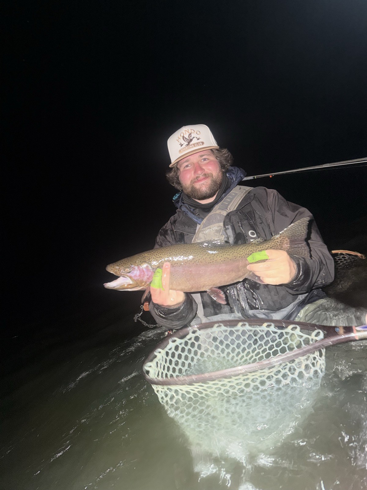 Happy angler with a beautiful trout near Rock Springs, Wyoming